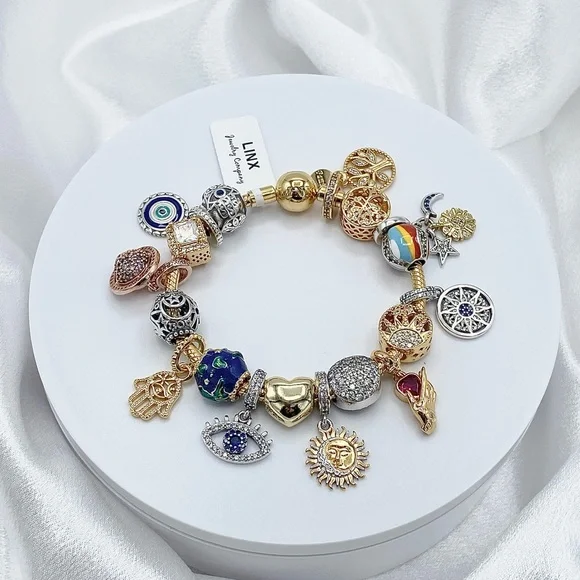 Linx Gold Snake Chain Bracelet with Universe Hamsa and Evil Eye Themed Charms
